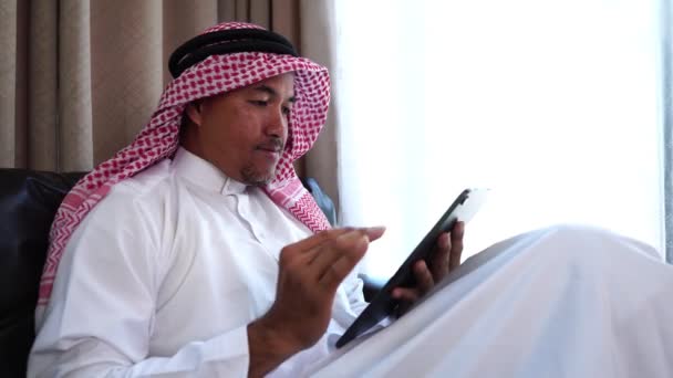 Happy Middle Eastern Businessman Working Home — Stockvideo