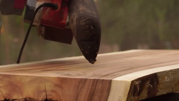 Male Carpenter Using Electric Woodworking Tool Work Outdoors — Vídeos de Stock