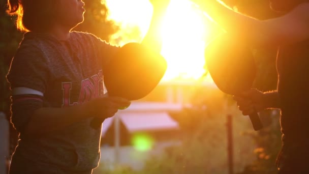 People Having Fun Playing Pickleball Sunset — Vídeos de Stock