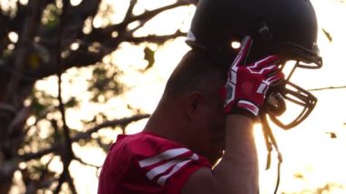 close-up footage of handsome man with baseball sports uniform and helmet