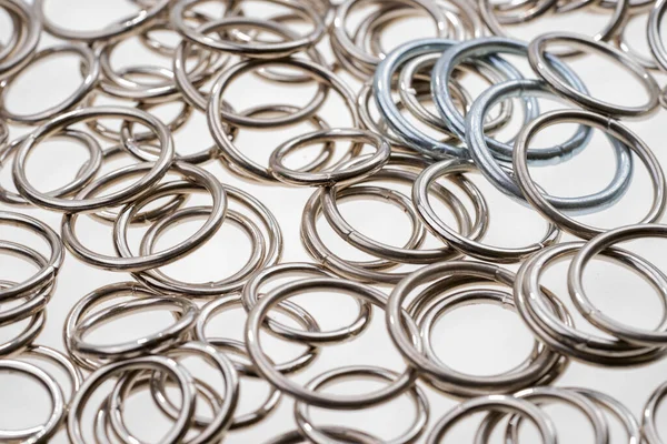 stock image Many metal rings on a light background