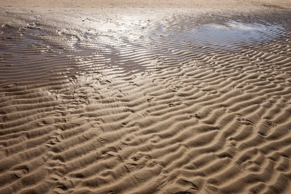 Areia Molhada Com Marcas Vento Praia — Fotografia de Stock