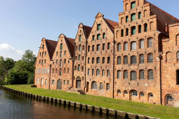 stock image Historic salt store buildings in the old town of Luebeck. Tourist attraction on a sunny day. Germany