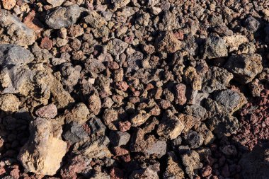 Küçük kırmızı ve gri volkanik taşlar. Tenerife. Kanarya Adası, İspanya