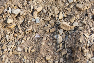 Yol yapımı için kaba çakıllar. Çakıl arkaplanı