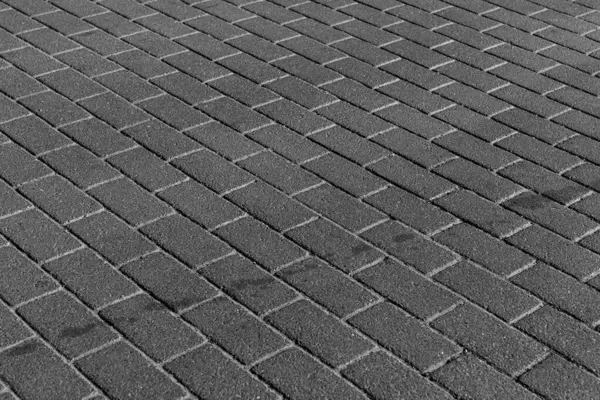 stock image Black stone pavement texture, cobbled street