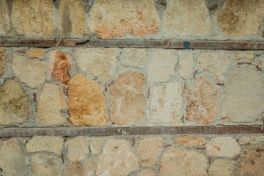Wall closeup hand construction stones texture