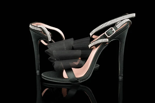 high heel shoes  on a black background
