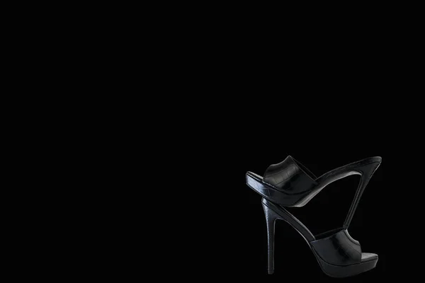 high heel shoes  on a black background