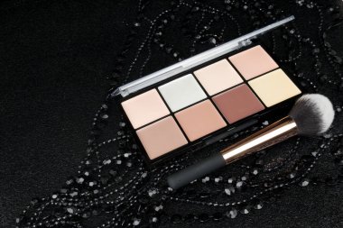 photo of Cosmetics on black background. 