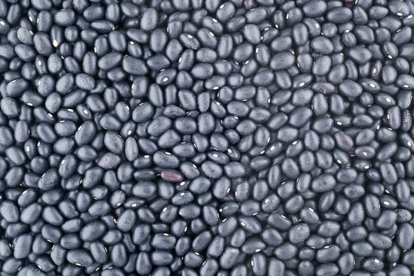 Top view of healthy grains black beans surface