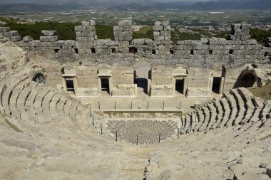 Kibyra odeon and Medusa mosaic on its floor clipart