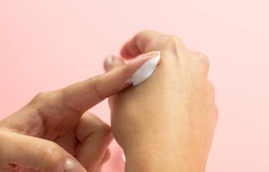 Applying moisturizing lotion to the skin, daily skin care,