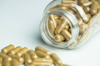 Ashwagandha pills with packaging on a white background, supplement, healthy organism, body protection