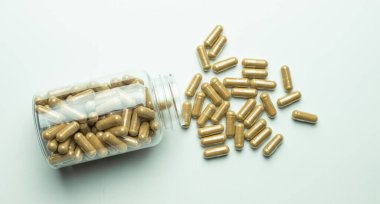 Ashwagandha pills with packaging on a white background, supplement, healthy organism, body protection