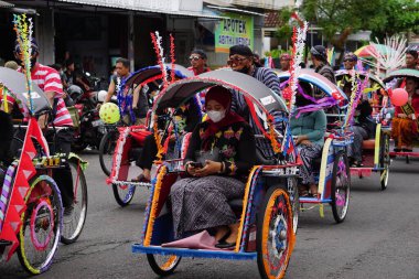 Pedicab carnival on celebration grebeg pancasila. Grebeg Pancasila is held to celebrate Pancasila day