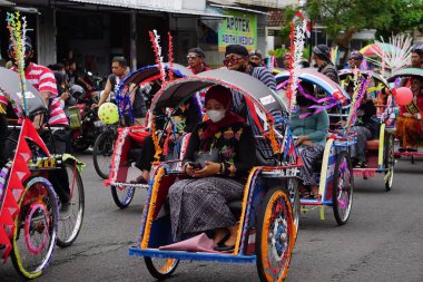 Pedicab carnival on celebration grebeg pancasila. Grebeg Pancasila is held to celebrate Pancasila day