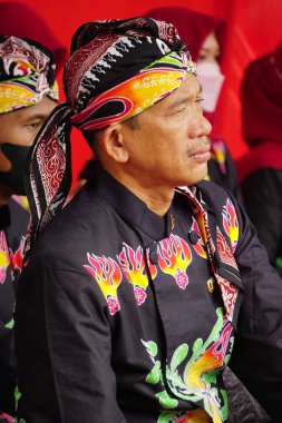 Javanese with traditional cloth on celebration grebeg pancasila