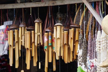 Bamboo wind chimes with a natural background