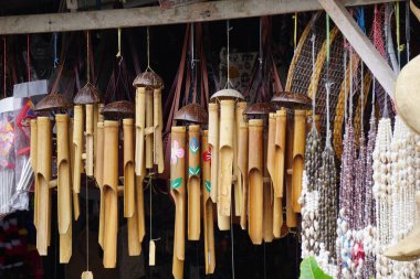 Bamboo wind chimes with a natural background