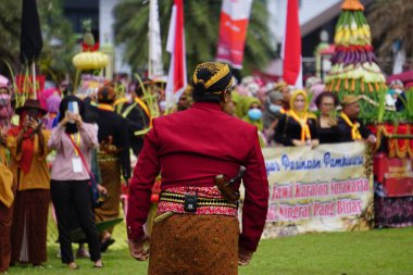 Indonesian with javanese traditional costume on grebeg pancasila. Grebeg pancasila held to celebrate pancasila day