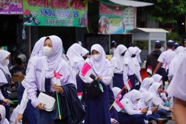 Indonesian Junior High School students celebrate grebeg pancasila