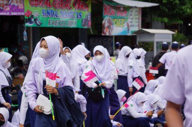 Indonesian Junior High School students celebrate grebeg pancasila
