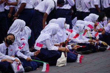 Indonesian Junior High School students celebrate grebeg pancasila