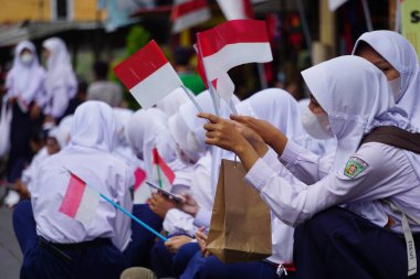 Indonesian Junior High School students celebrate grebeg pancasila