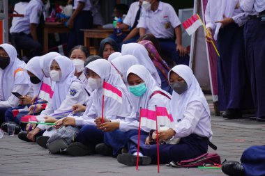 Indonesian Junior High School students celebrate grebeg pancasila