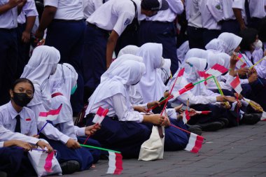 Indonesian Junior High School students celebrate grebeg pancasila