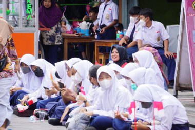 Indonesian Junior High School students celebrate grebeg pancasila