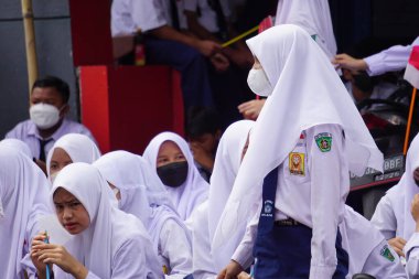 Indonesian Junior High School students celebrate grebeg pancasila