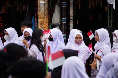 Indonesian Junior High School students celebrate grebeg pancasila