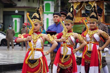 Indonesian with ancient Javanese soldier cloth on grebeg Pancasila ceremony clipart