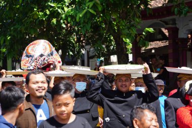 Javanese thanksgiving (Indonesian also call it Larung Semboyo, labuh laut, larung sesaji, sedekah laut). This thanksgiving held in sine beach