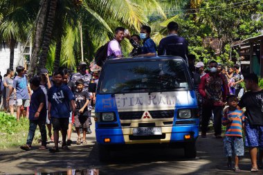 Javanese thanksgiving (Indonesian also call it Larung Semboyo, labuh laut, larung sesaji, sedekah laut). This thanksgiving held in sine beach