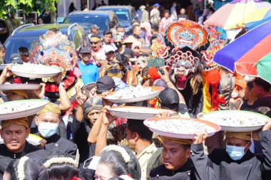 Javanese thanksgiving (Indonesian also call it Larung Semboyo, labuh laut, larung sesaji, sedekah laut). This thanksgiving held in sine beach