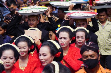 Javanese thanksgiving (Indonesian also call it Larung Semboyo, labuh laut, larung sesaji, sedekah laut). This thanksgiving held in sine beach