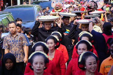 Javanese thanksgiving (Indonesian also call it Larung Semboyo, labuh laut, larung sesaji, sedekah laut). This thanksgiving held in sine beach