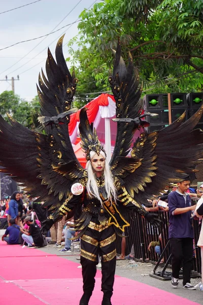 Stock image The participant in Biro Fashion Carnival. This is one of the Indonesian costume carnivals