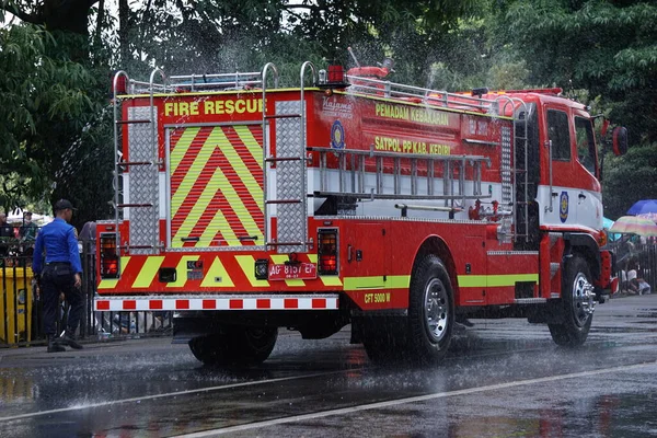 stock image Red fire truck on the road