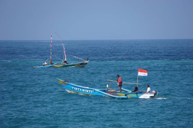 Tambakrejo sahilinde Petik laut töreni. Petik laut, Cava balıkçılarının şükran günüdür ve Endonezya 'nın soyut kültürel mirasından biridir.
