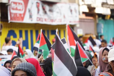 Bazı Endonezyalılar arabasız bir günde özgür bir Filistin istiyor.