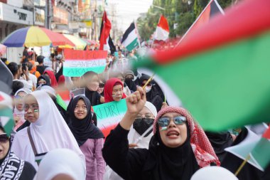 Bazı Endonezyalılar arabasız bir günde özgür bir Filistin istiyor.