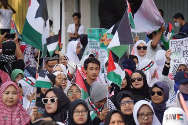 Bazı Endonezyalılar arabasız bir günde özgür bir Filistin istiyor.