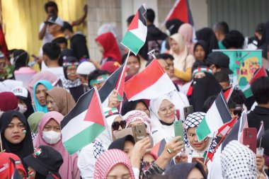 Bazı Endonezyalılar arabasız bir günde özgür bir Filistin istiyor.