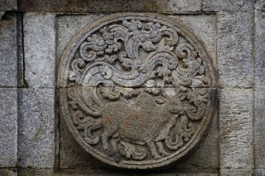 Penataran tapınağında hayvan bakıcılarıyla madalyon..