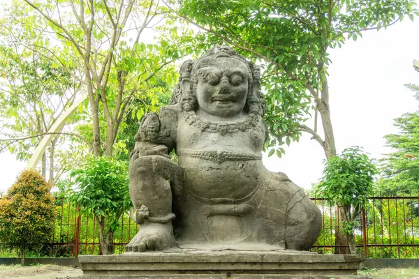stock image Totok Kerot statue in Kediri. This statue is a 3m tall inscription in the form of a giant statue of Dwarapala, which originates from the kingdom of Kediri.