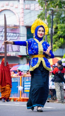 The Lupe dance comes from Bima (Nusa Tenggara Barat) on 3rd BEN Carnival. Lupe is an umbrella made from mountain pandan leaves clipart